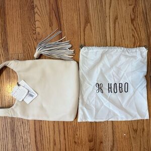 HOBO Ivory Pebble Leather Hobo with Tassel Accent